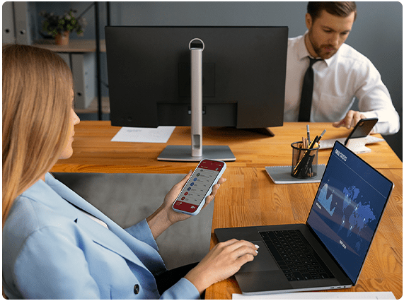 Employees using time and attendance software